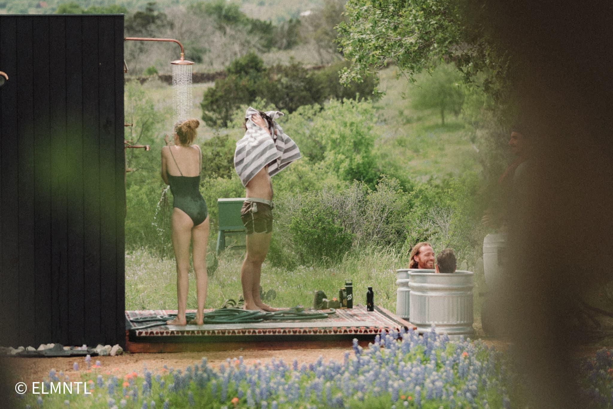 Guests enjoying outdoor shower and cold plunge