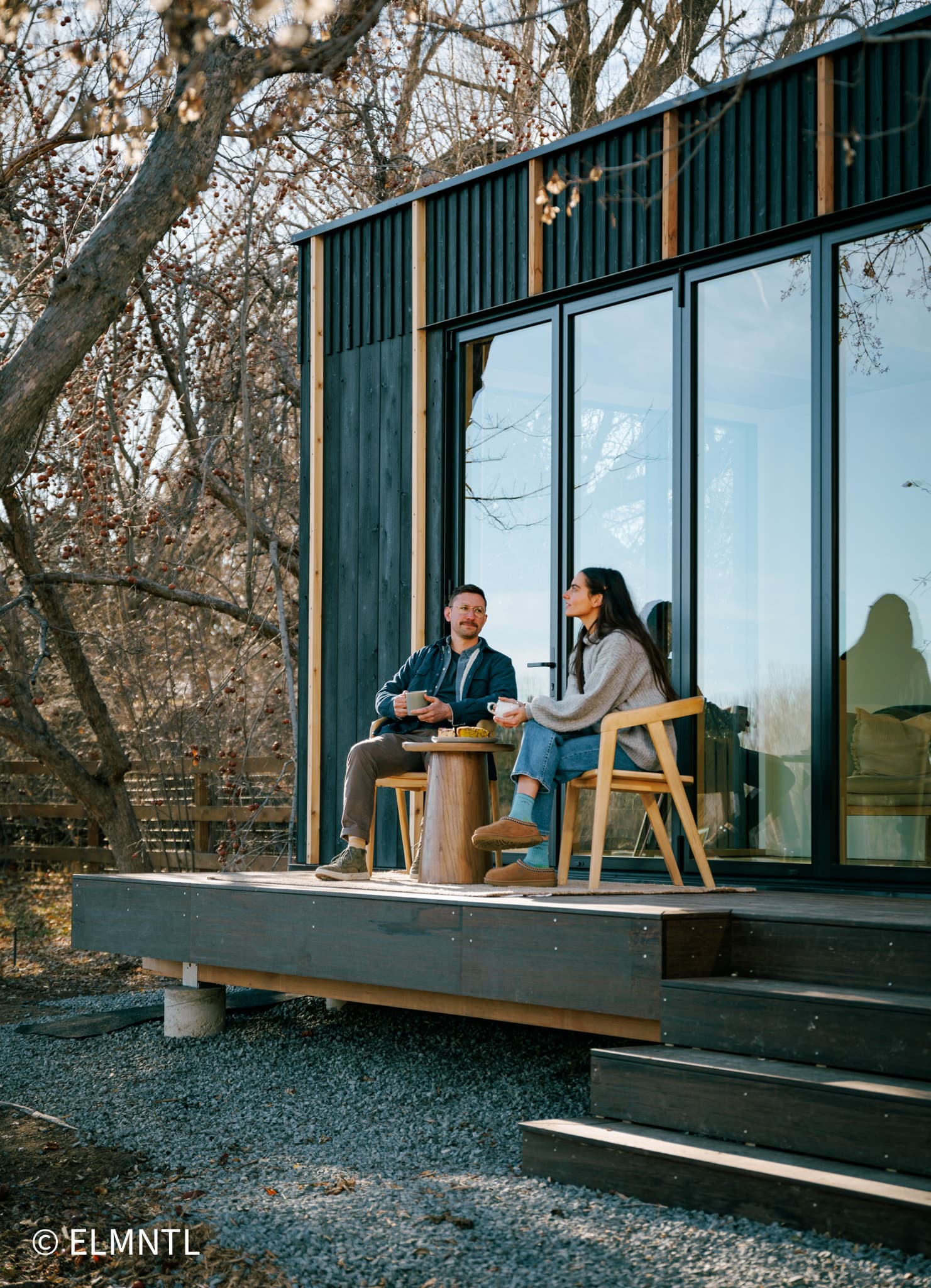 Couple enjoying an Elmntl Shelter Studio porch